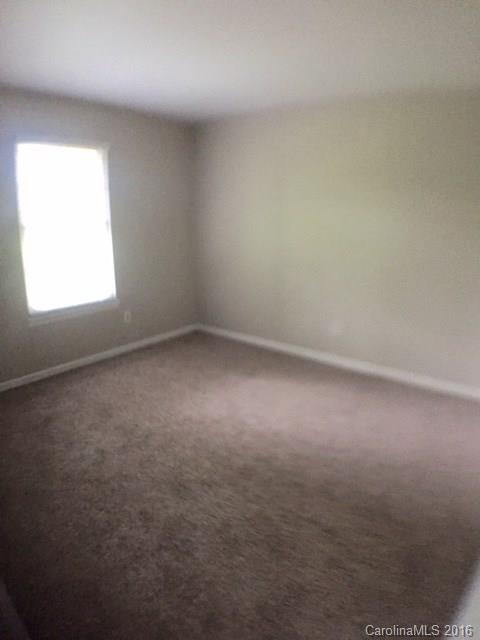 9242 Fairway Ridge Road Charlotte, NC 28277 - Photo 11 of 17 an empty room with a window