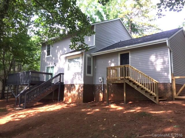 9242 Fairway Ridge Road Charlotte, NC 28277 - Photo 14 of 17 a front view of a house with a yard
