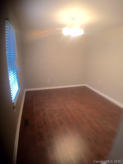 9242 Fairway Ridge Road Charlotte, NC 28277 - Photo 6 of 17 a view of an empty room and window