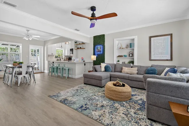 a living room with furniture and a table