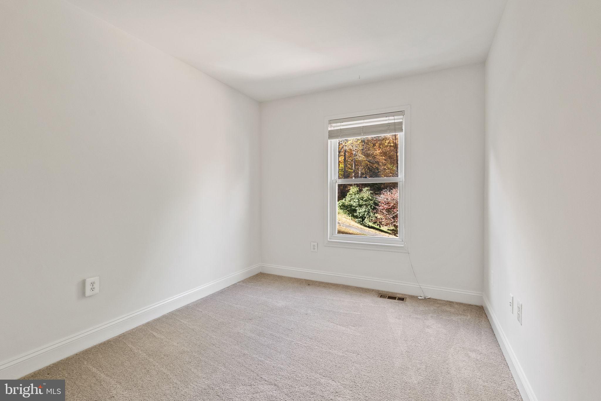8914 Shamrock Court Springfield, VA 22152 - Photo 19 of 29 an empty room with a window