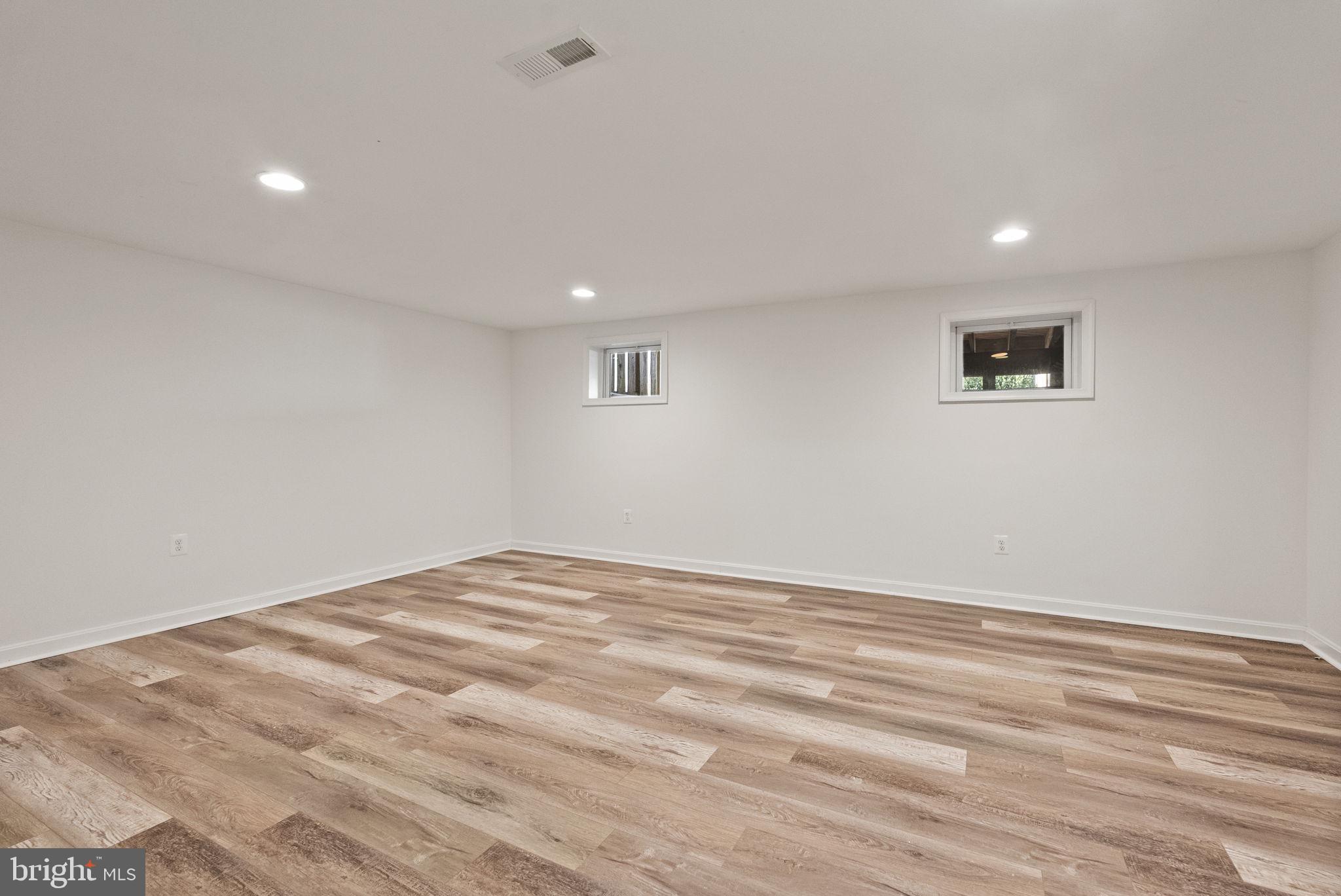 8914 Shamrock Court Springfield, VA 22152 - Photo 25 of 29 a view of empty room with wooden floor