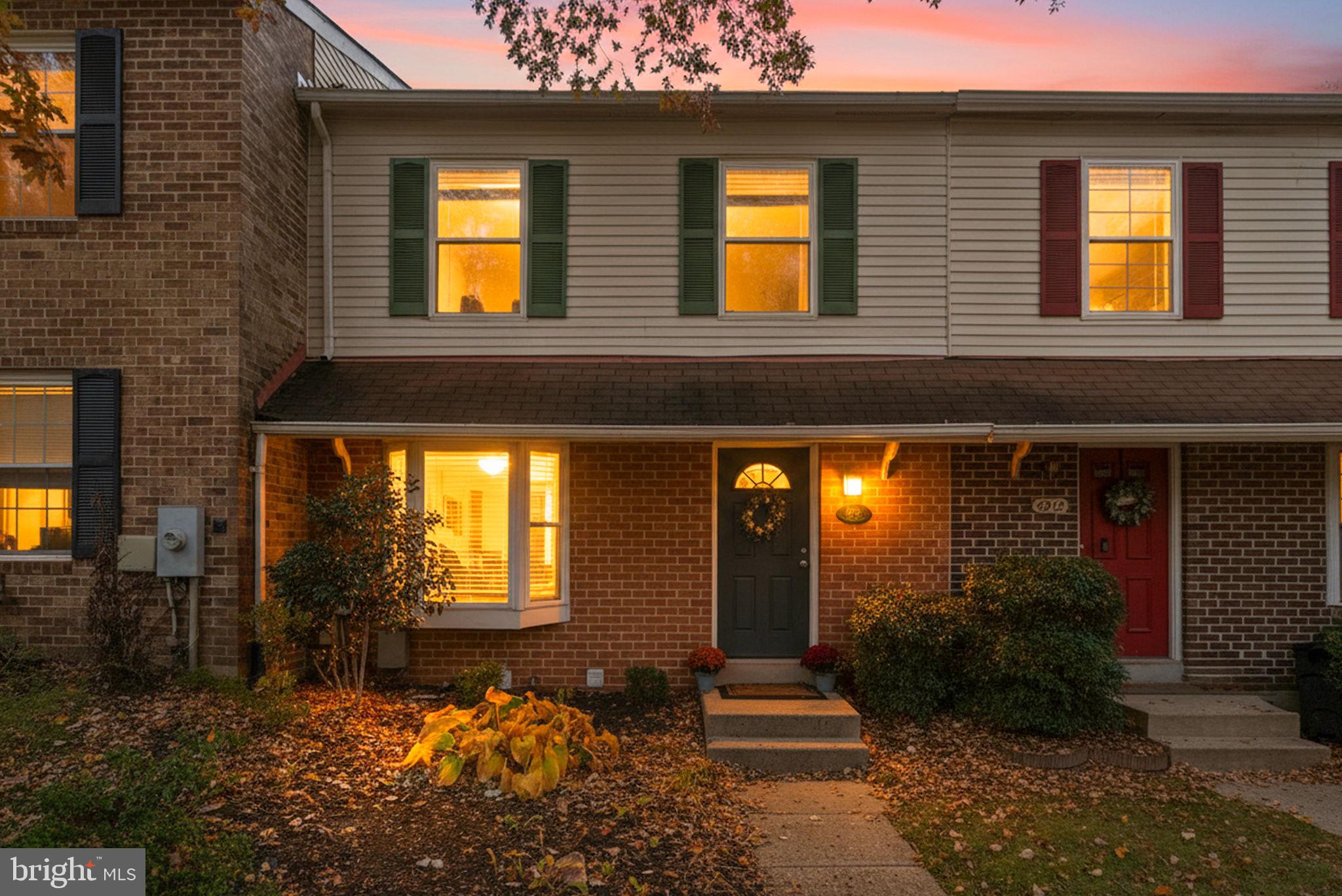 8914 Shamrock Court Springfield, VA 22152 - Photo 4 of 29 a view of a house with potted plants in front of door