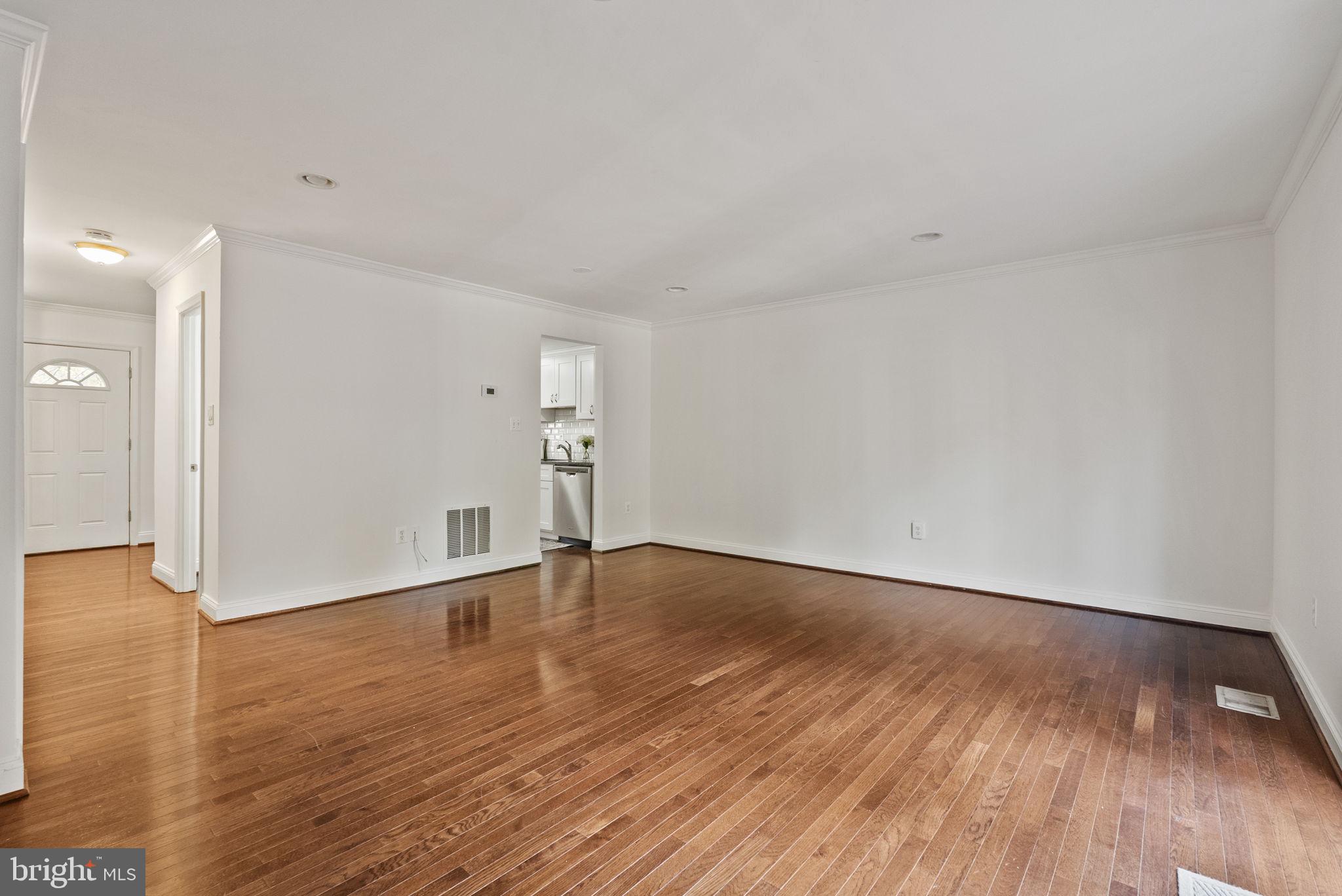 8914 Shamrock Court Springfield, VA 22152 - Photo 10 of 29 a view of an empty room and wooden floor