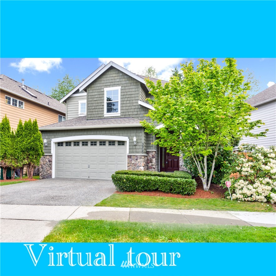 3915 167th Street Southeast Bothell, WA 98012 - Photo 2 of 28 a view of a house with a yard and potted plants