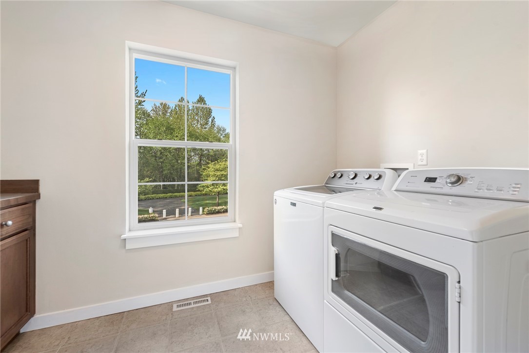 3915 167th Street Southeast Bothell, WA 98012 - Photo 22 of 28 a utility room with dryer and washer
