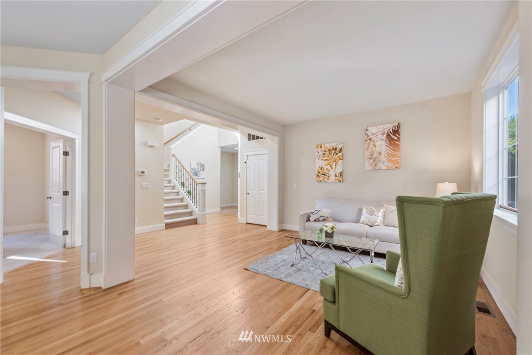 3915 167th Street Southeast Bothell, WA 98012 - Photo 5 of 28 a living room with furniture and wooden floor