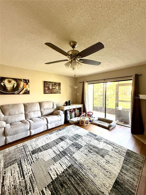 1920 Whitney Way Clearwater, FL 33760 - Photo 12 of 38 a bedroom with furniture and a large window