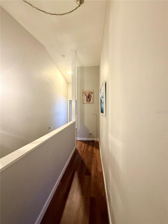 1920 Whitney Way Clearwater, FL 33760 - Photo 14 of 38 a view of a hallway with wooden floor