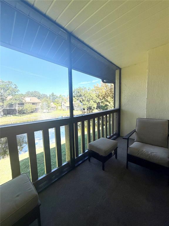 1920 Whitney Way Clearwater, FL 33760 - Photo 22 of 38 a living room with furniture and a large window