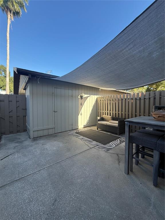 1920 Whitney Way Clearwater, FL 33760 - Photo 5 of 38 a view of backyard and a garage