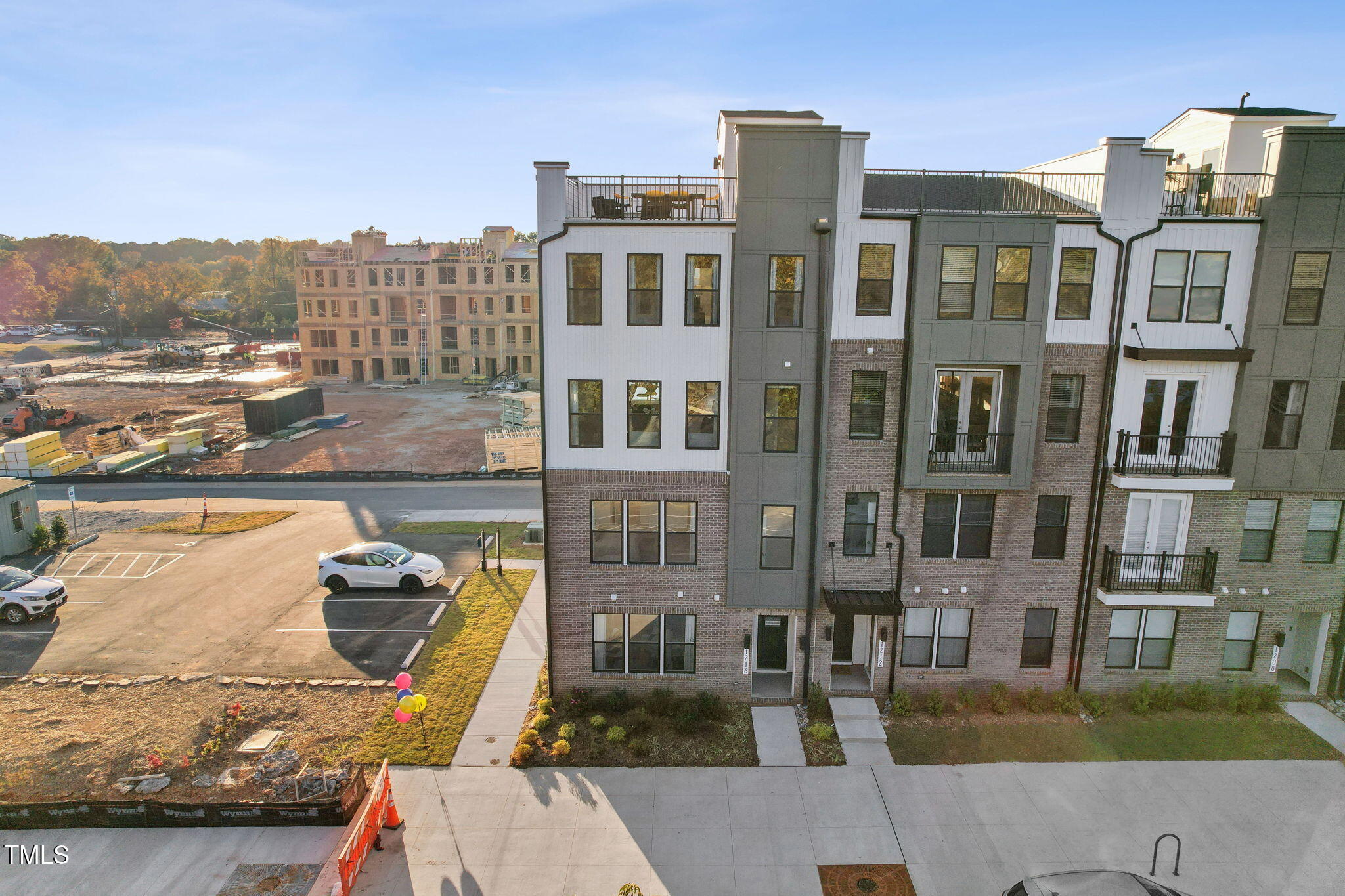 1259 Shaw View Alley, Unit 101 Raleigh, NC 27601 - Photo 2 of 19 a front view of a building with outdoor space