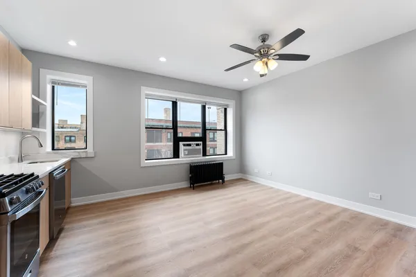 a view of an empty room with a window