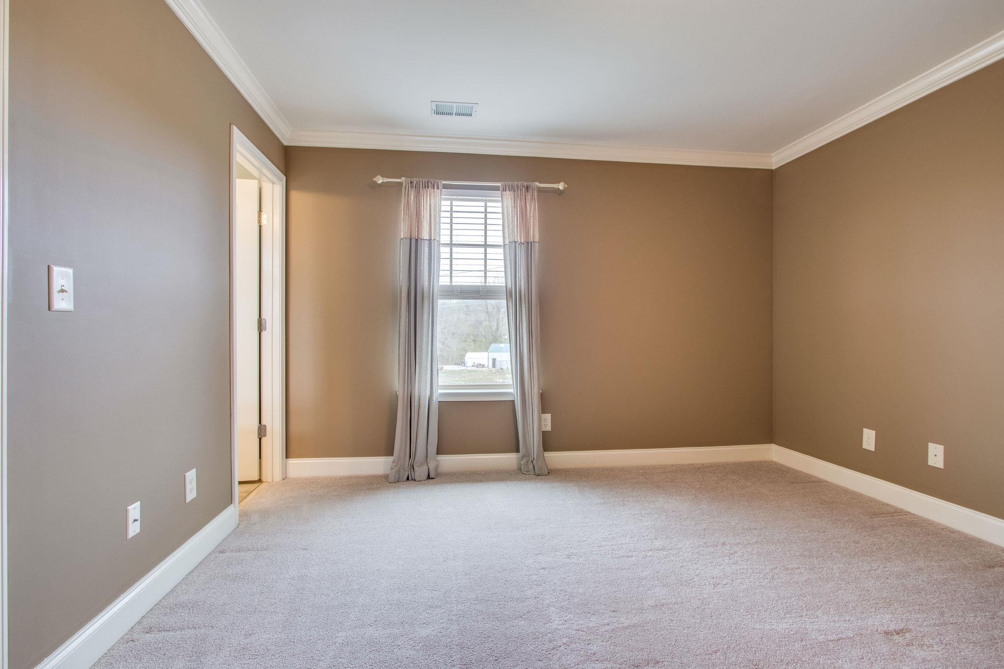 735 Tulip Grove Road, Unit 237 Hermitage, TN 37076 - Photo 22 of 29 a view of an empty room with a window