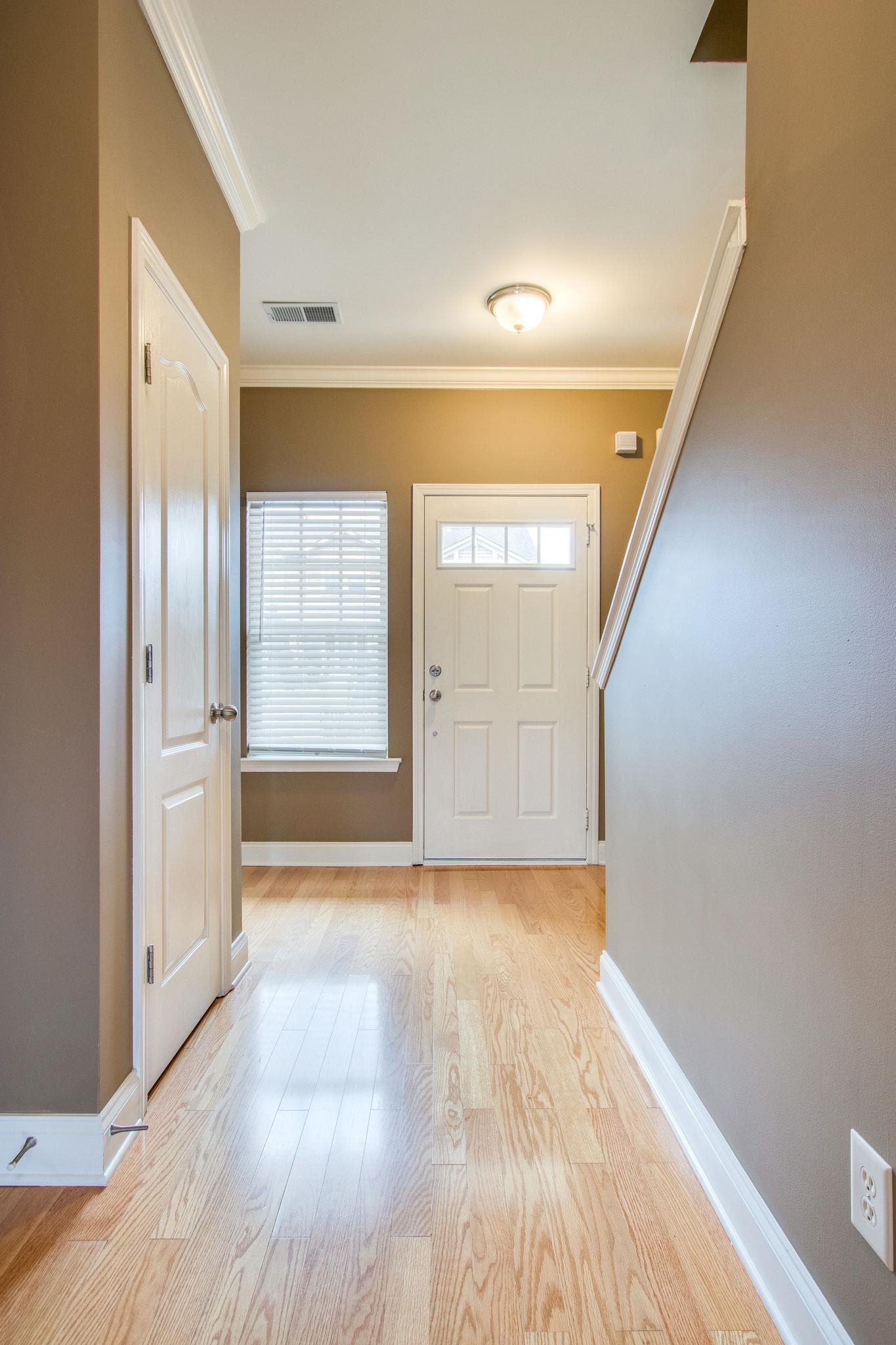 735 Tulip Grove Road, Unit 237 Hermitage, TN 37076 - Photo 6 of 29 a view of empty room with wooden floor and fan