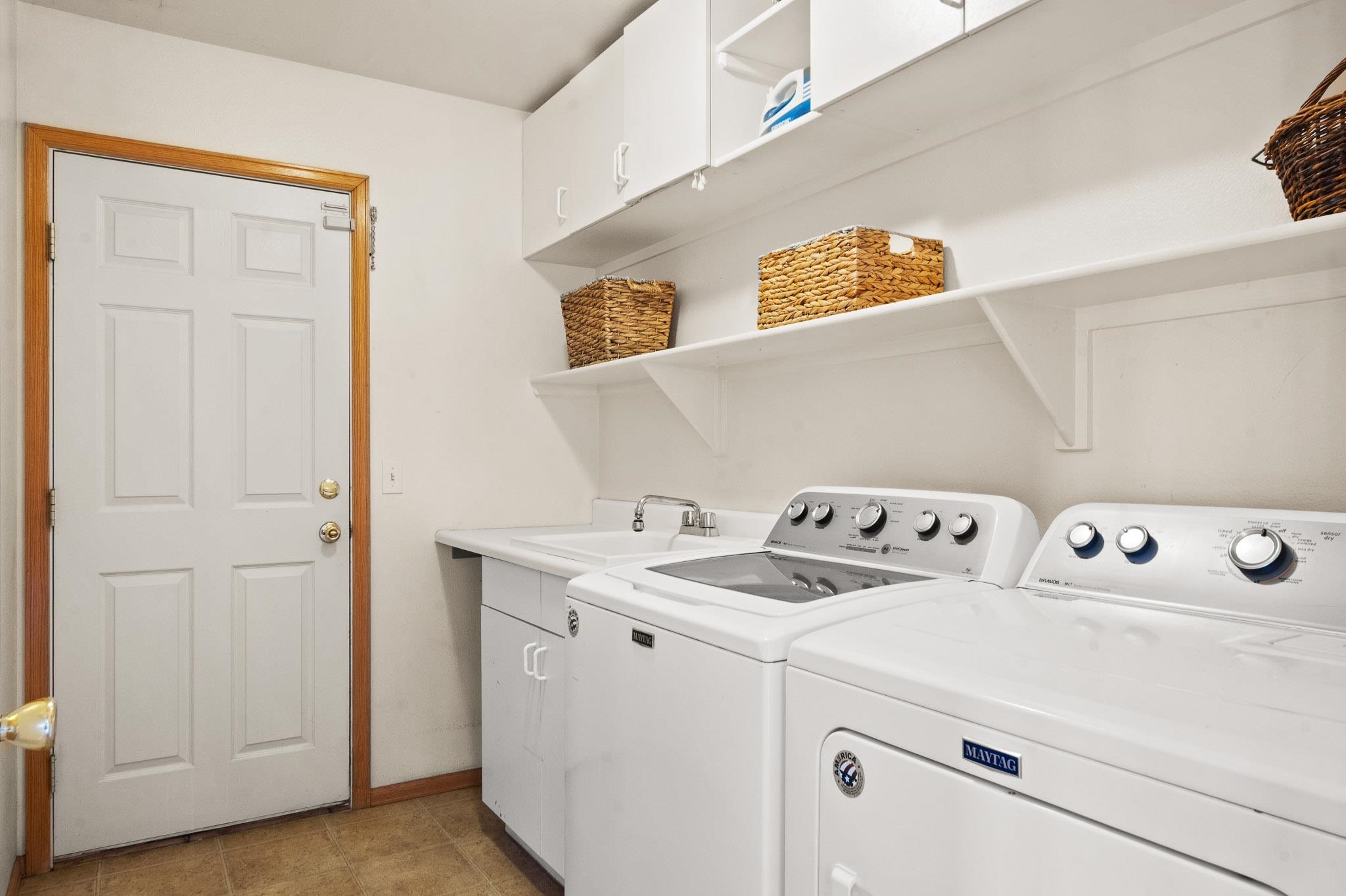 912 Kaley Street Fruita, CO 81521 - Photo 17 of 32 a utility room with dryer and washer