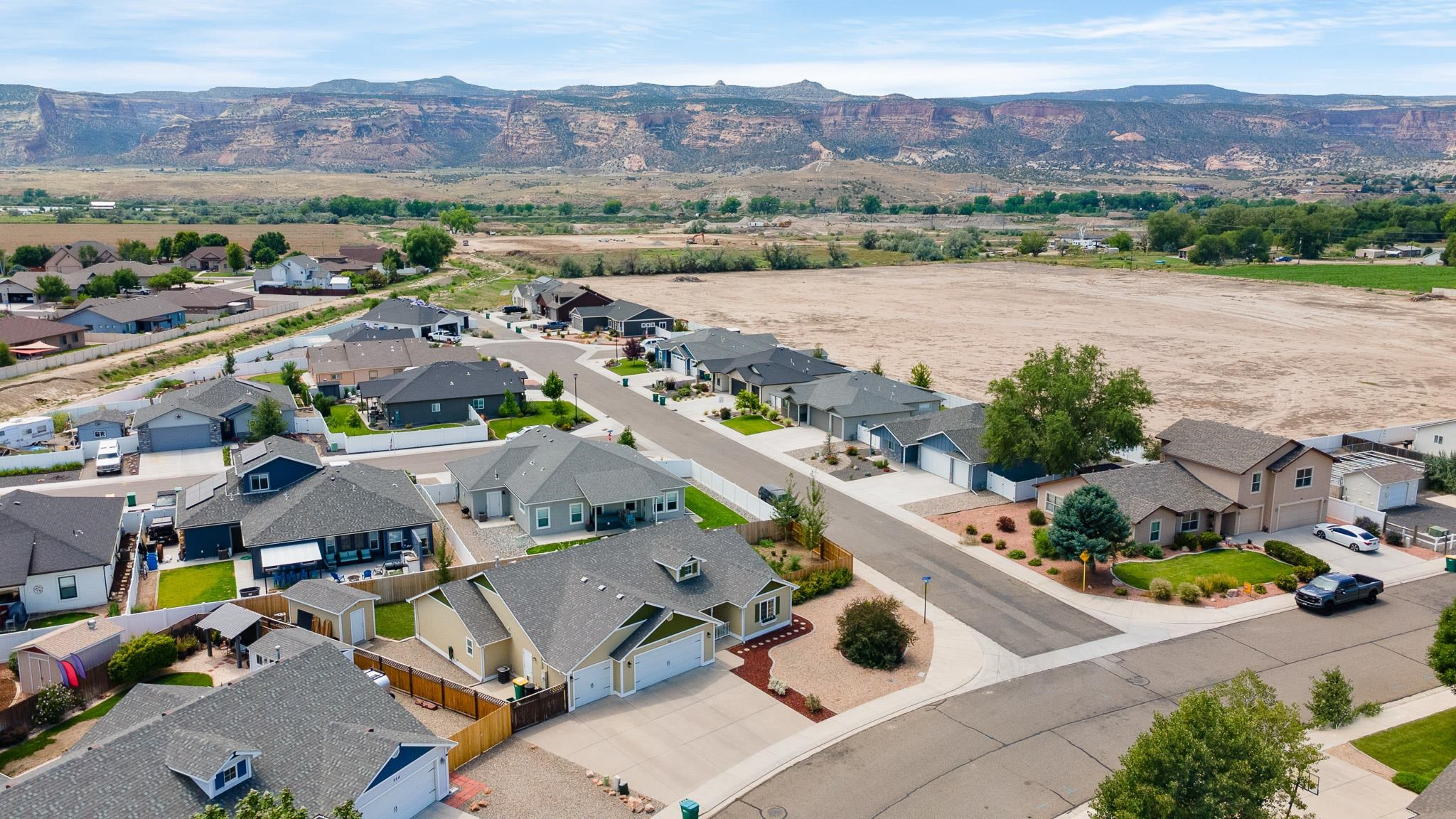 912 Kaley Street Fruita, CO 81521 - Photo 24 of 32 an aerial view of a city with lots of residential buildings