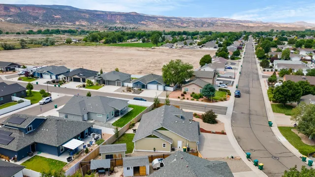 an aerial view of a house with a garden