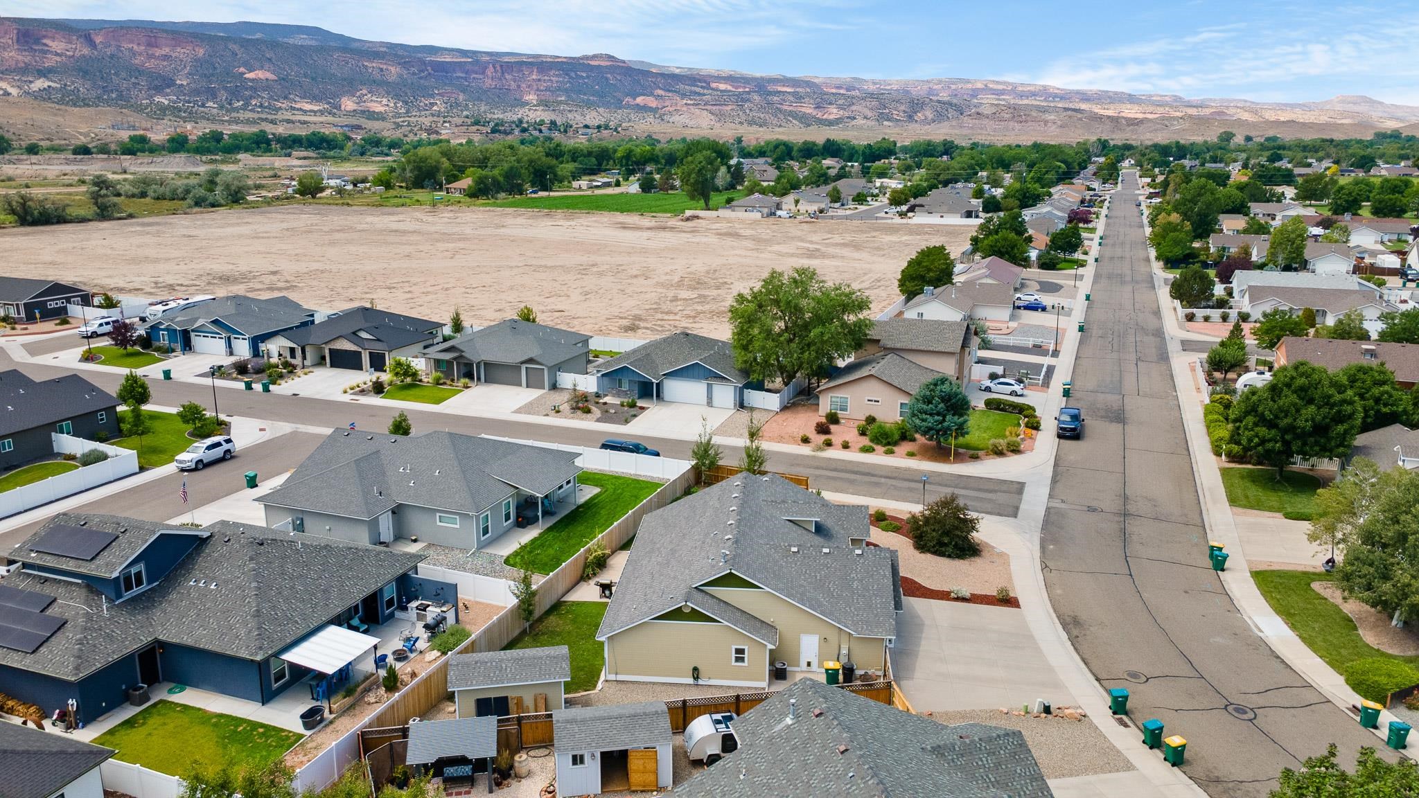 912 Kaley Street Fruita, CO 81521 - Photo 28 of 32 an aerial view of residential houses with outdoor space and river