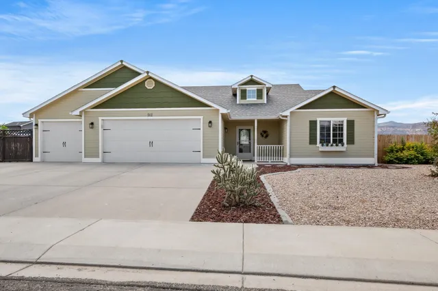 a view of a house with a garage