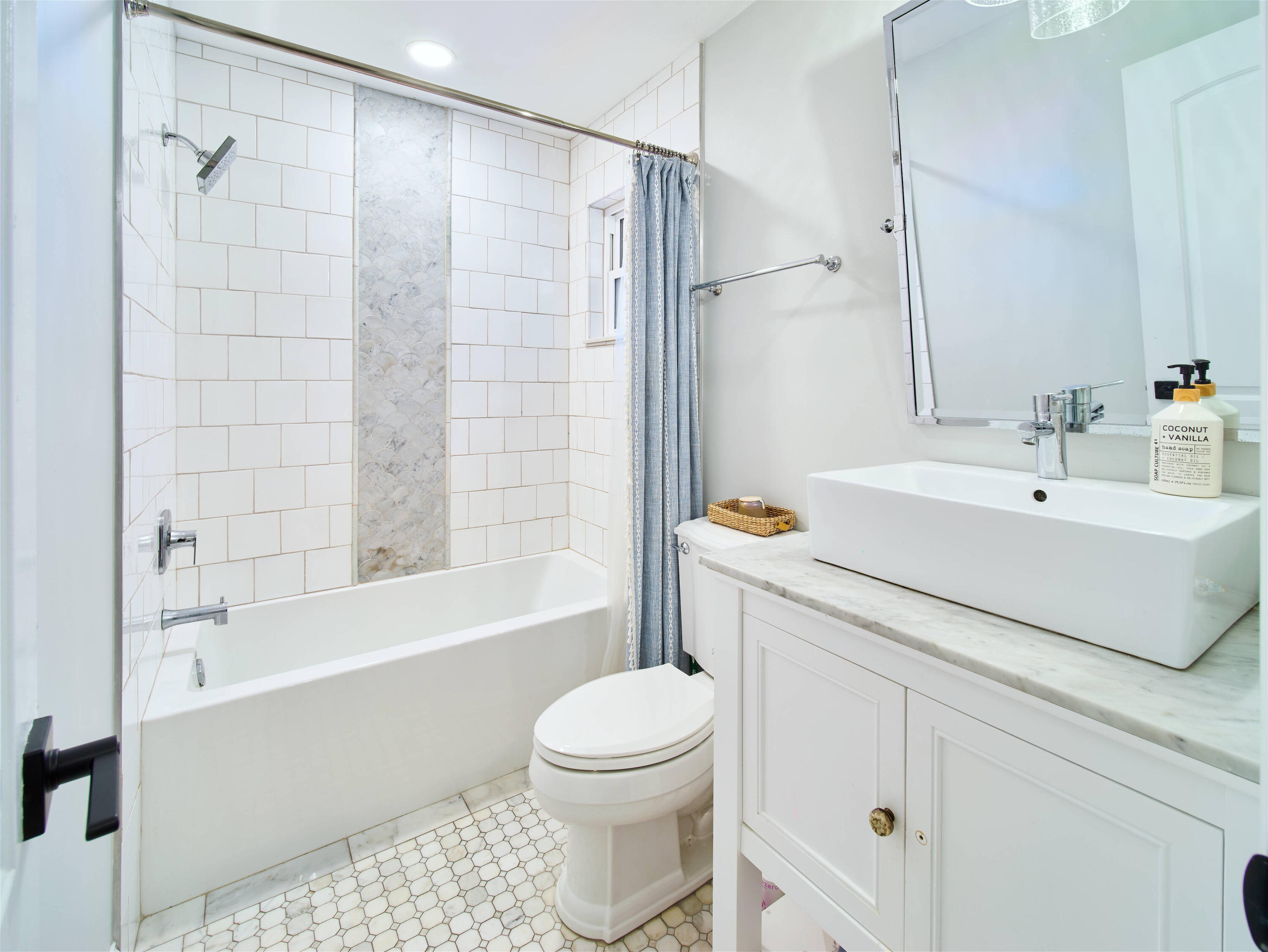 359 Church Road Tequesta, FL 33469 - Photo 16 of 30 a bathroom with a sink toilet and shower