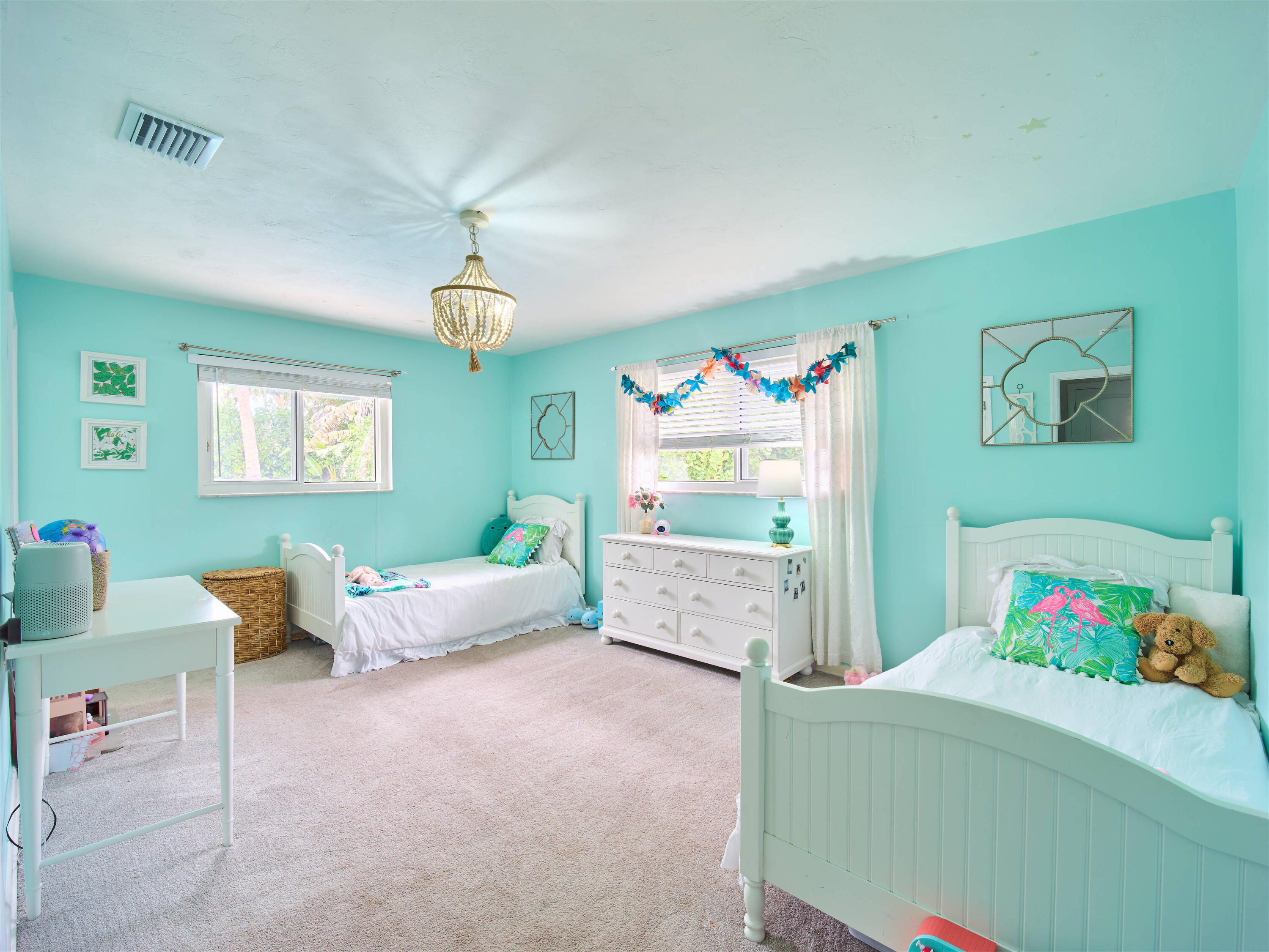 359 Church Road Tequesta, FL 33469 - Photo 17 of 30 a bedroom with furniture and a window