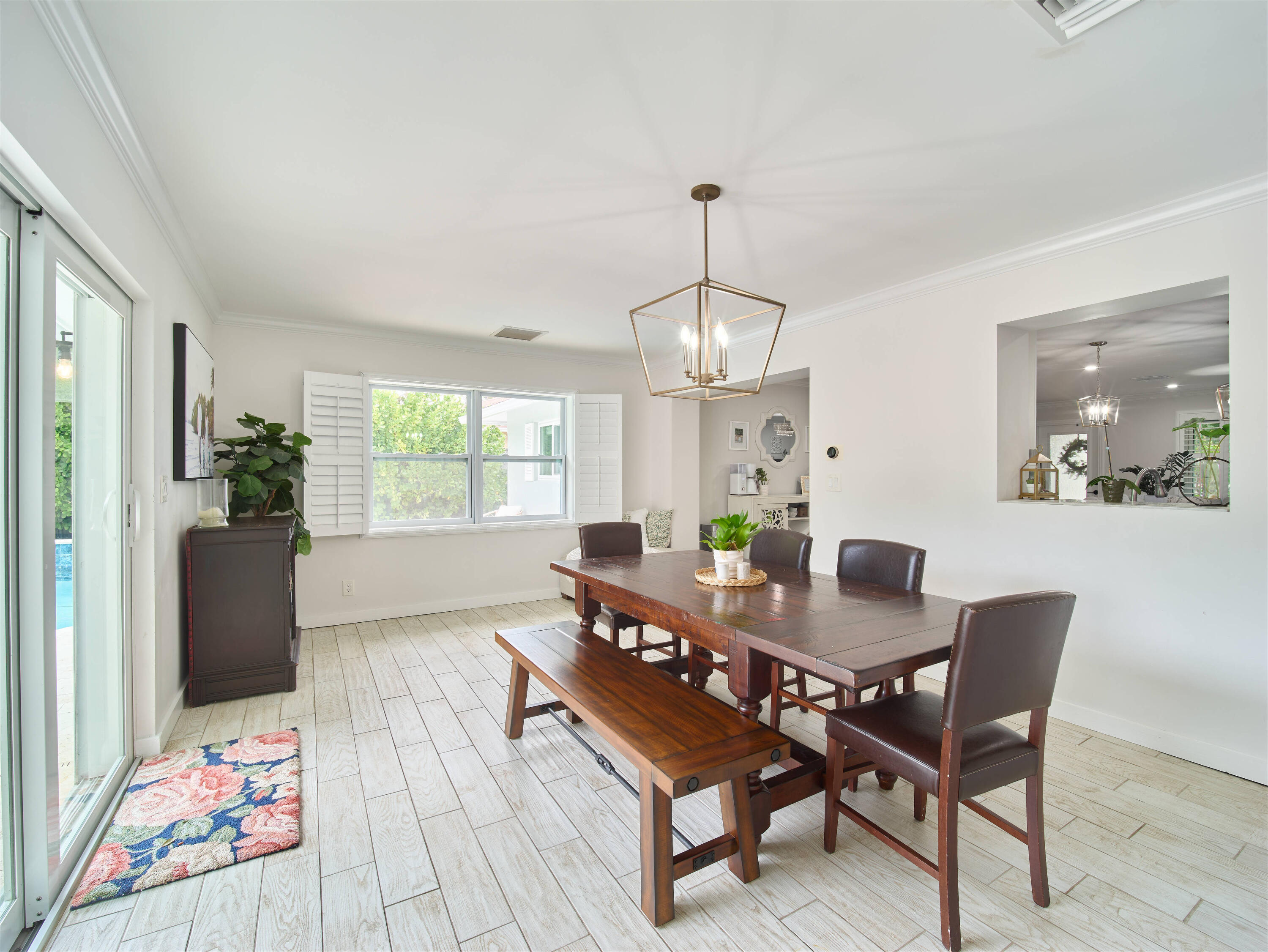 359 Church Road Tequesta, FL 33469 - Photo 19 of 30 a view of a dining room with furniture
