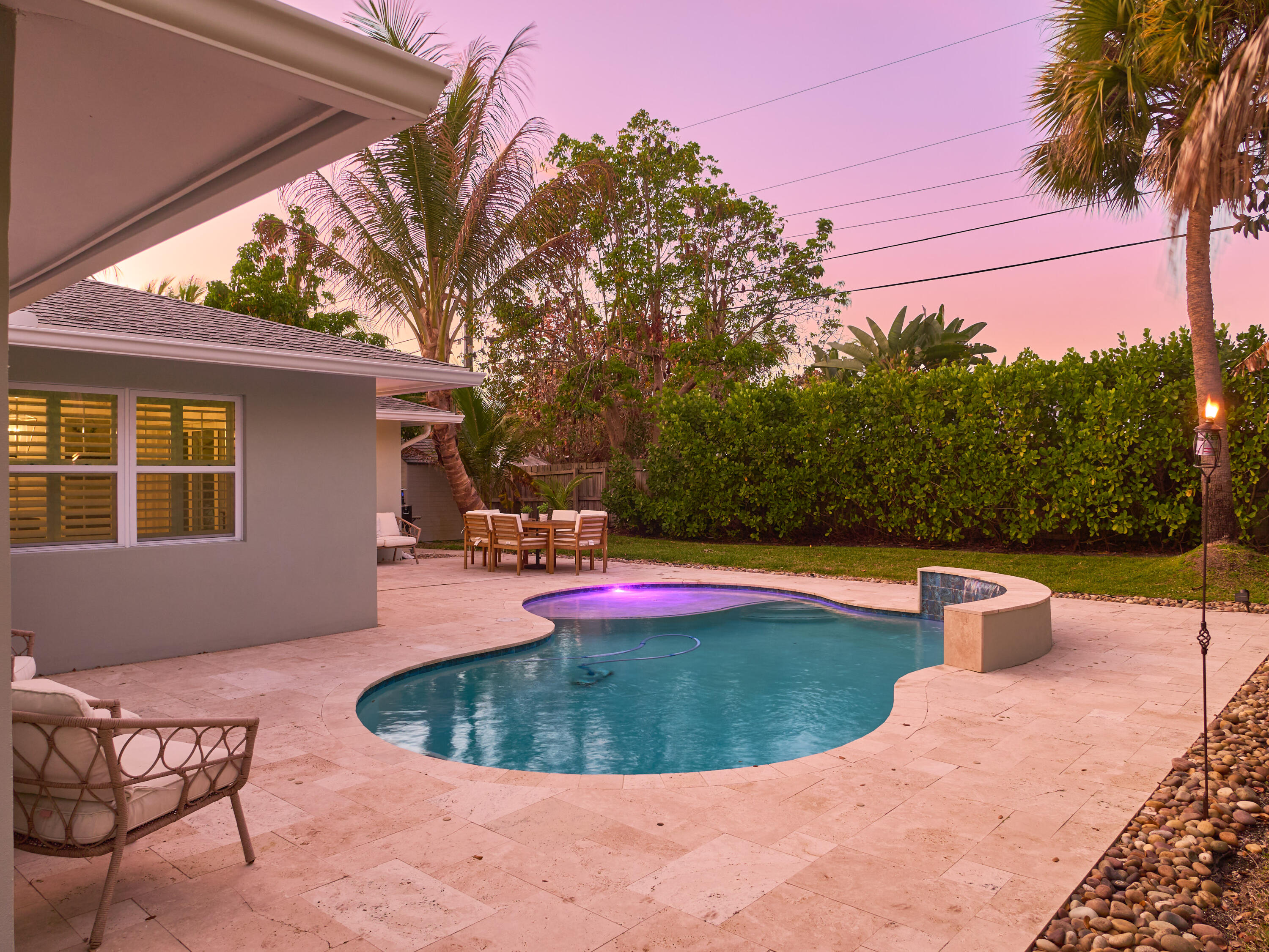 359 Church Road Tequesta, FL 33469 - Photo 25 of 30 a view of a swimming pool with a yard