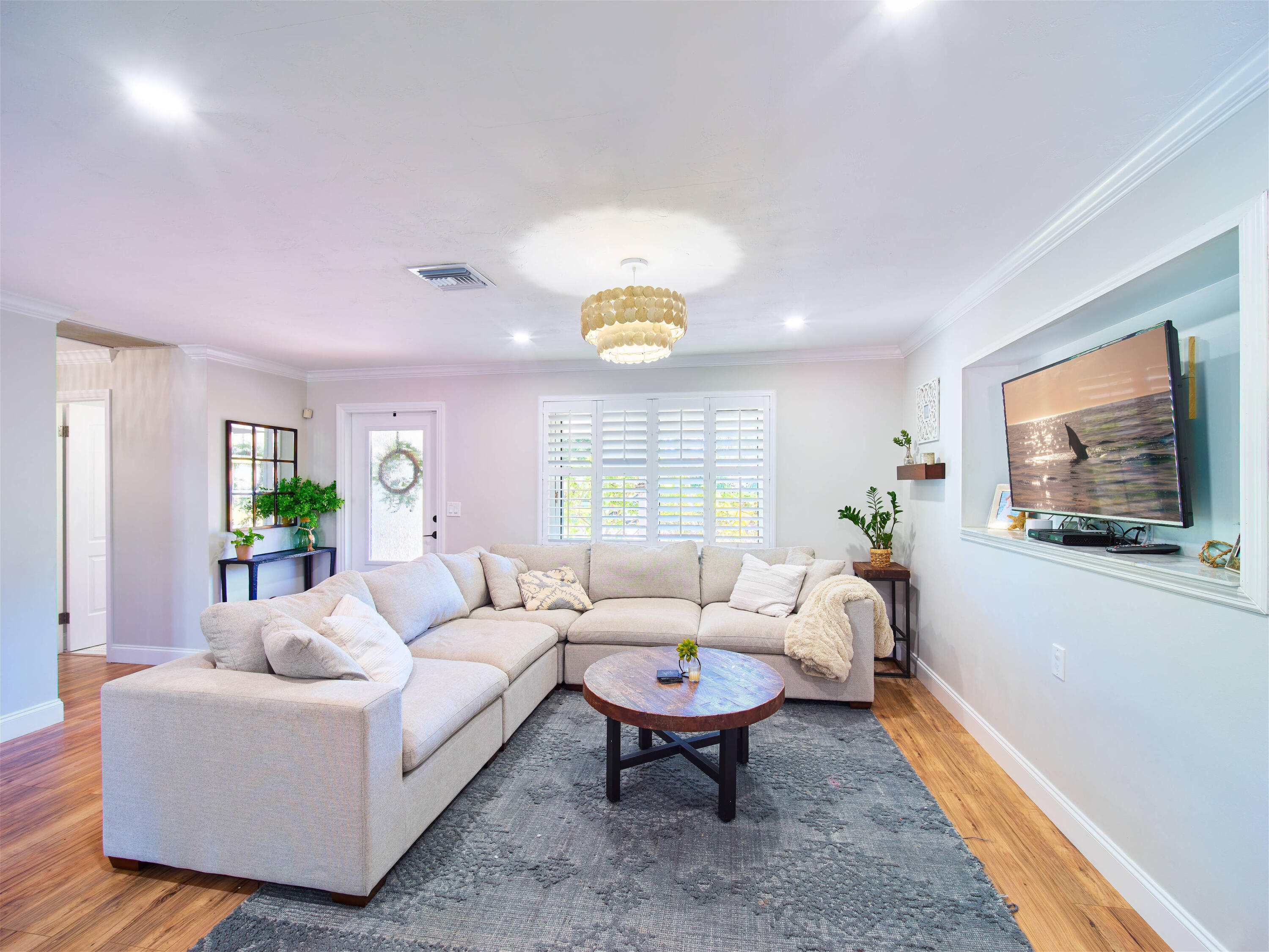 359 Church Road Tequesta, FL 33469 - Photo 3 of 30 a living room with furniture a rug and a large window