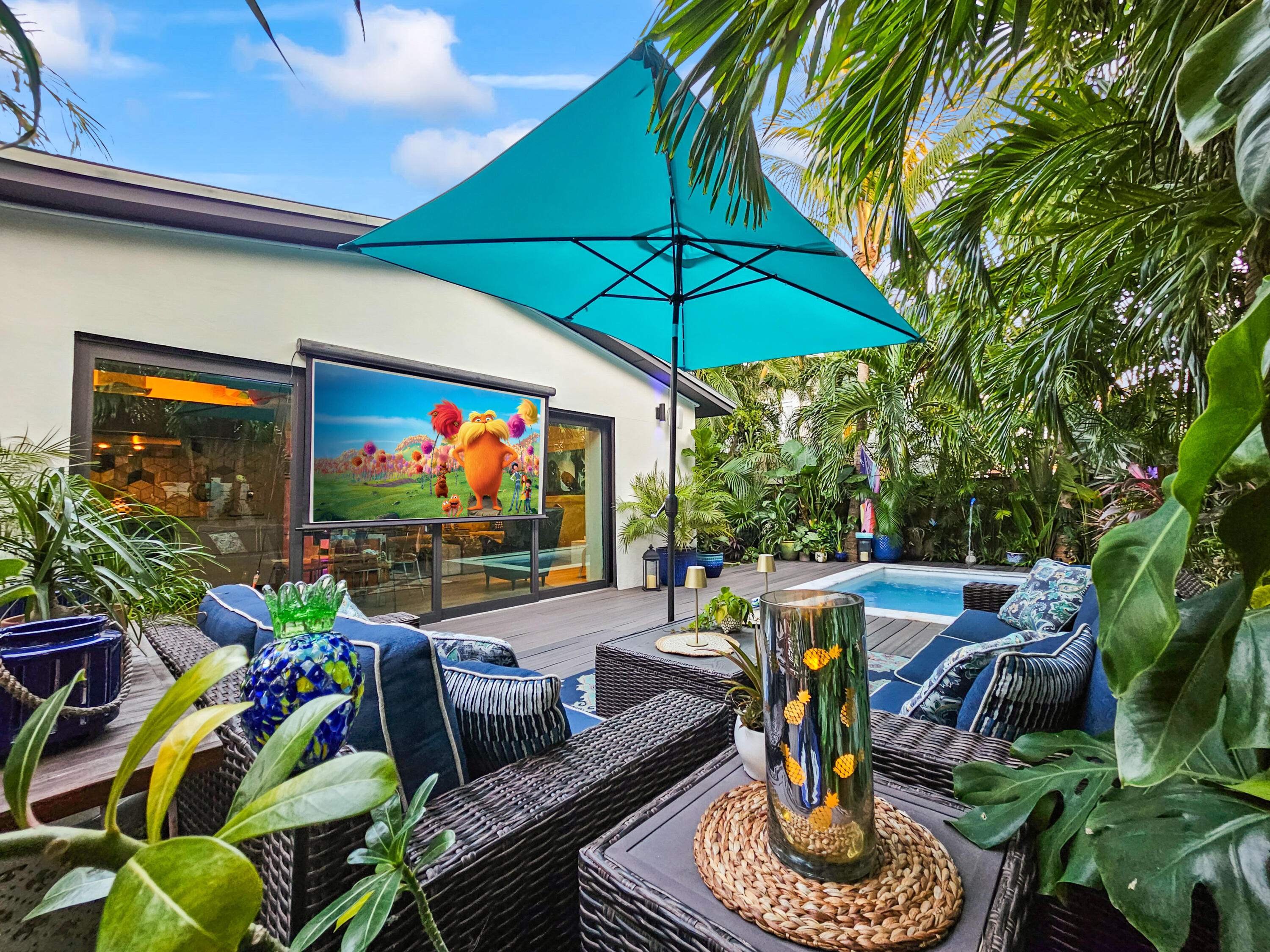 1616 Bertha Street, Unit 2 Key West, FL 33040 - Photo 2 of 45 a view of an outdoor sitting area with golf course