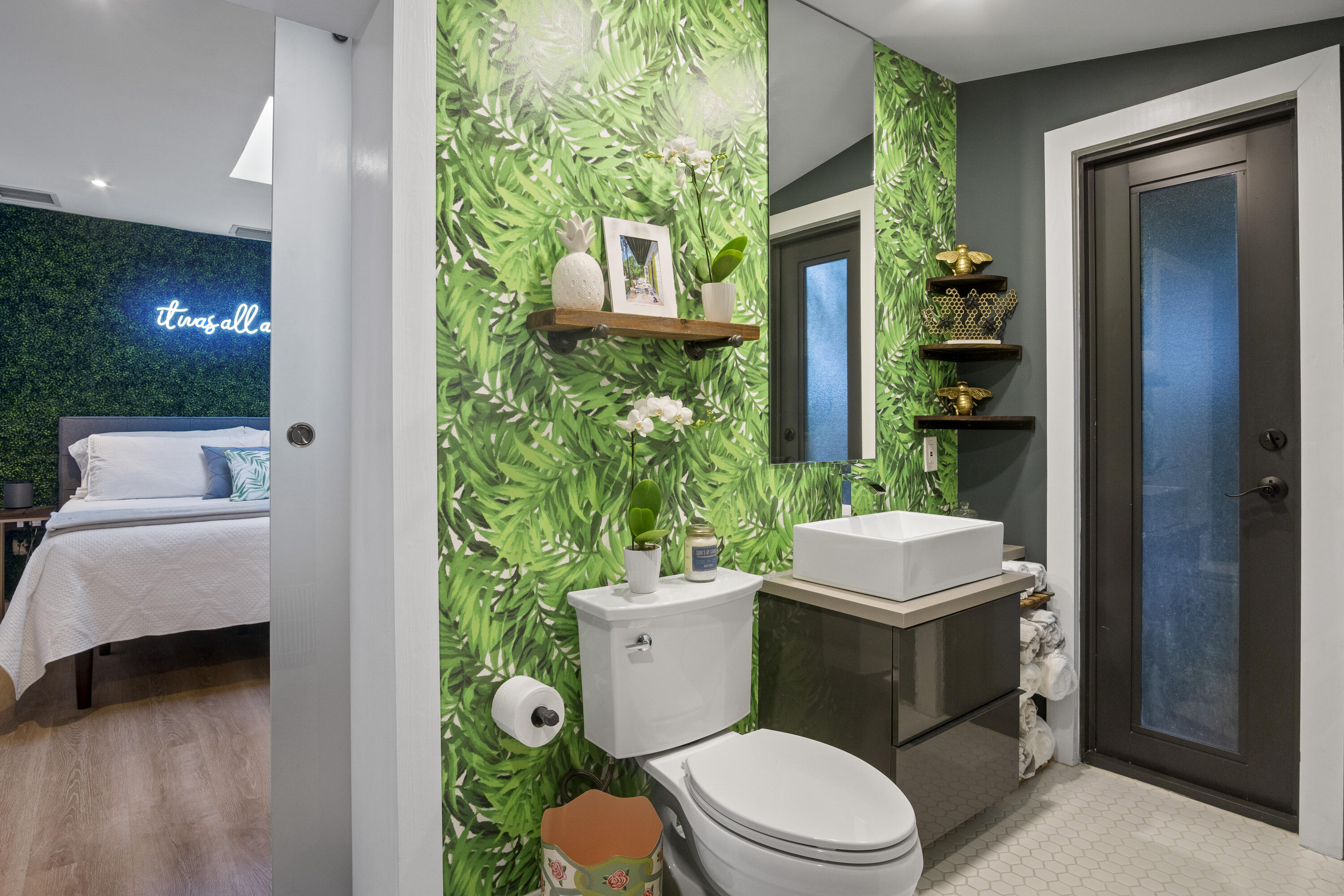 1616 Bertha Street, Unit 2 Key West, FL 33040 - Photo 26 of 45 a bathroom with a toilet a sink and a mirror