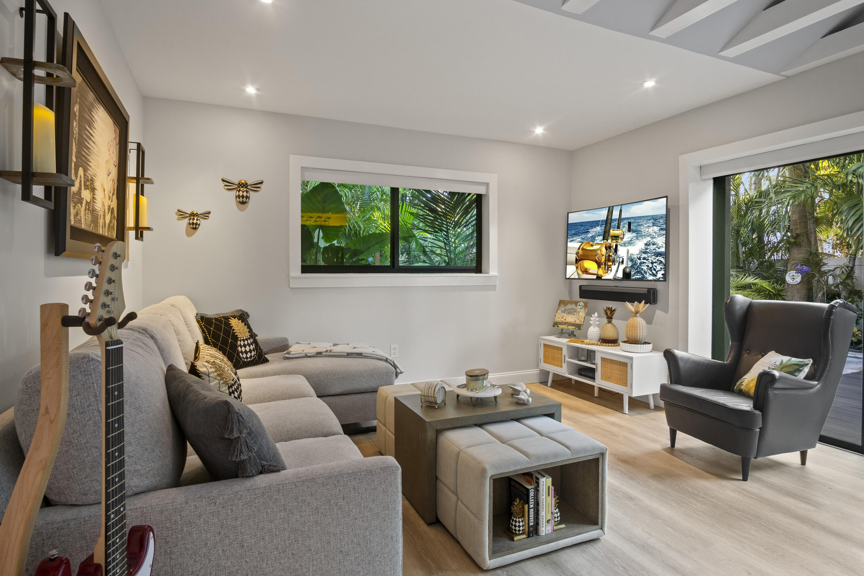 1616 Bertha Street, Unit 2 Key West, FL 33040 - Photo 7 of 45 a living room with furniture and a flat screen tv