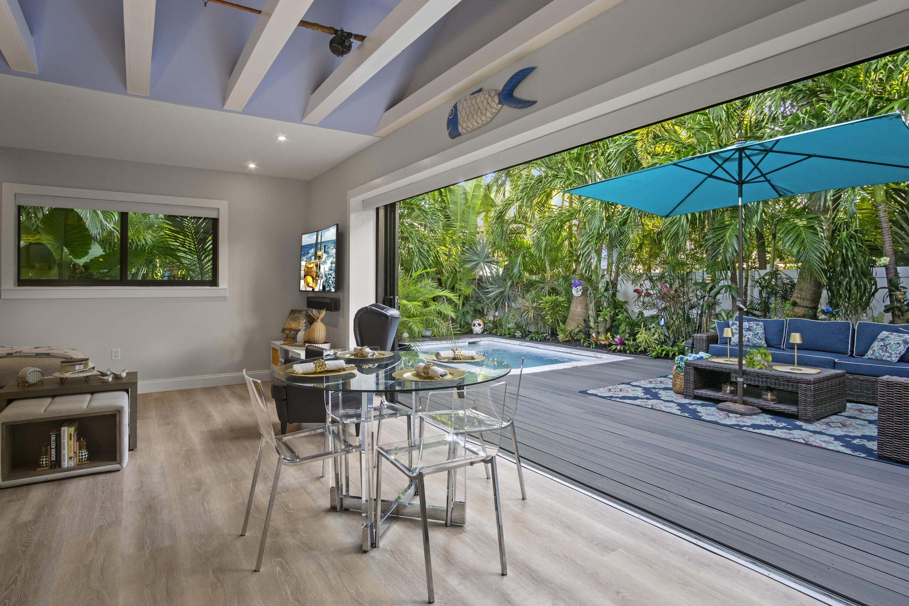 1616 Bertha Street, Unit 2 Key West, FL 33040 - Photo 9 of 45 a dining room with furniture and garden view