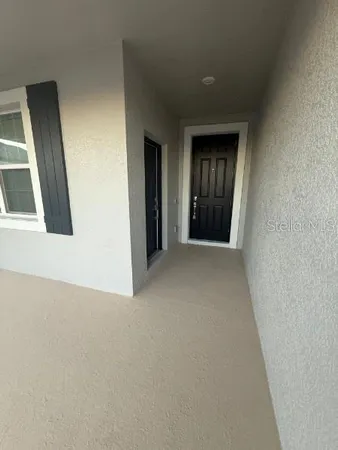 a view of hallway with front door