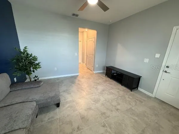 a kitchen with stainless steel appliances a refrigerator and a stove