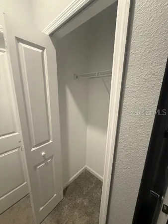 a bathroom with a sink vanity and a mirror