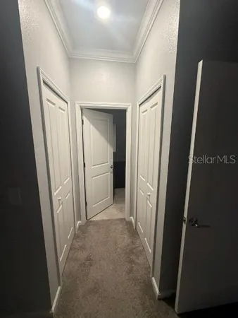 a view of a backyard of the house