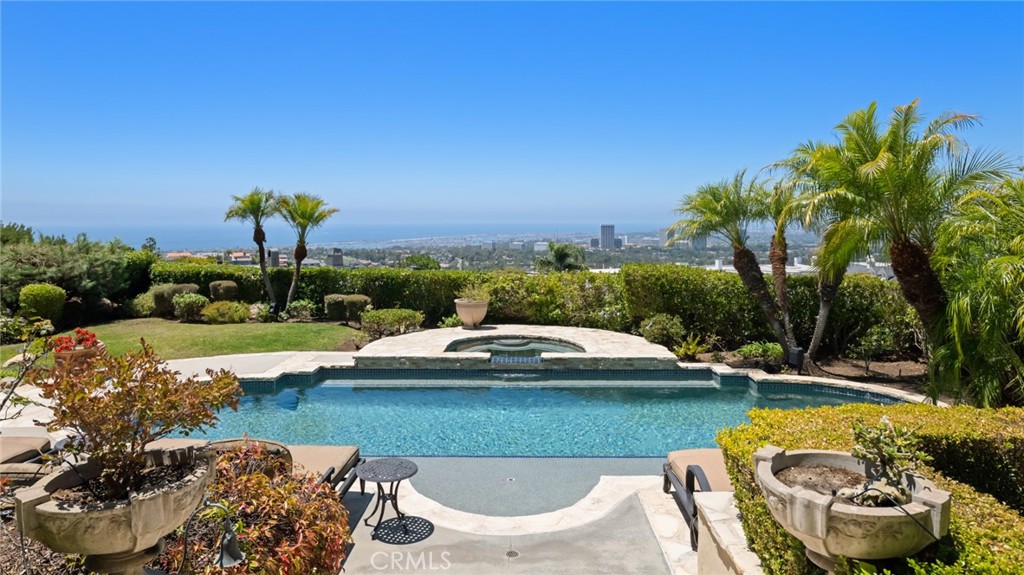 5 Ridgeline Drive Newport Beach, CA 92660 - Photo 2 of 16 a view of a swimming pool and lounge chair