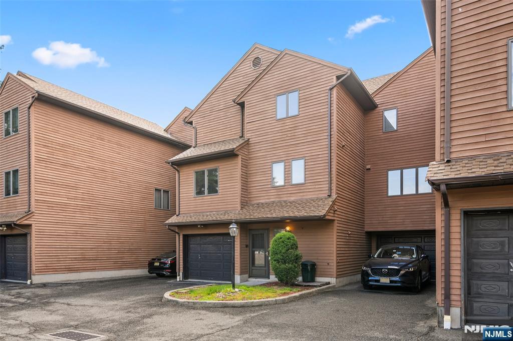 140 Allwood Road, Unit C Clifton, NJ 07012 - Photo 2 of 31 a view of a car park in front of house