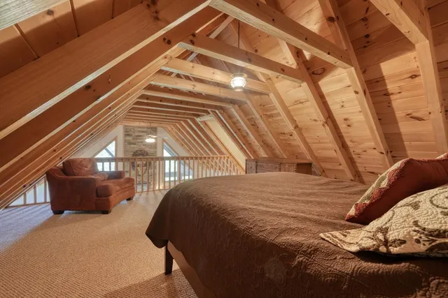 a view of a a dining room with furniture window and wooden floor