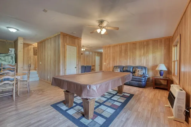 a room with furniture and wooden floor