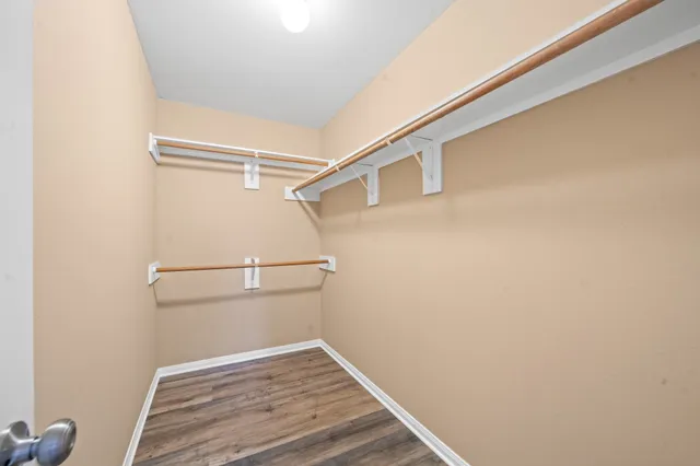 a view of an empty walk in closet