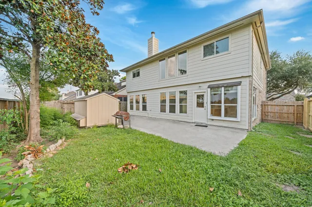a house view with a garden space