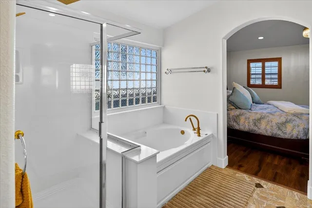 a view of entryway with wooden floor