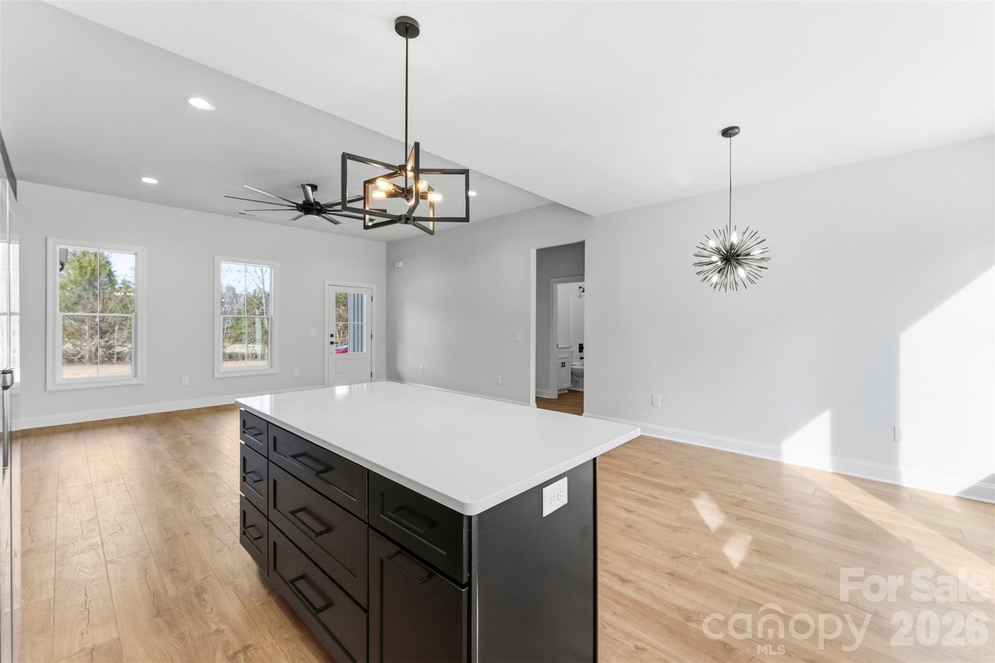1724 Barnhardt Road China Grove, NC 28023 - Photo 16 of 46 a view of a kitchen with a sink and chandelier