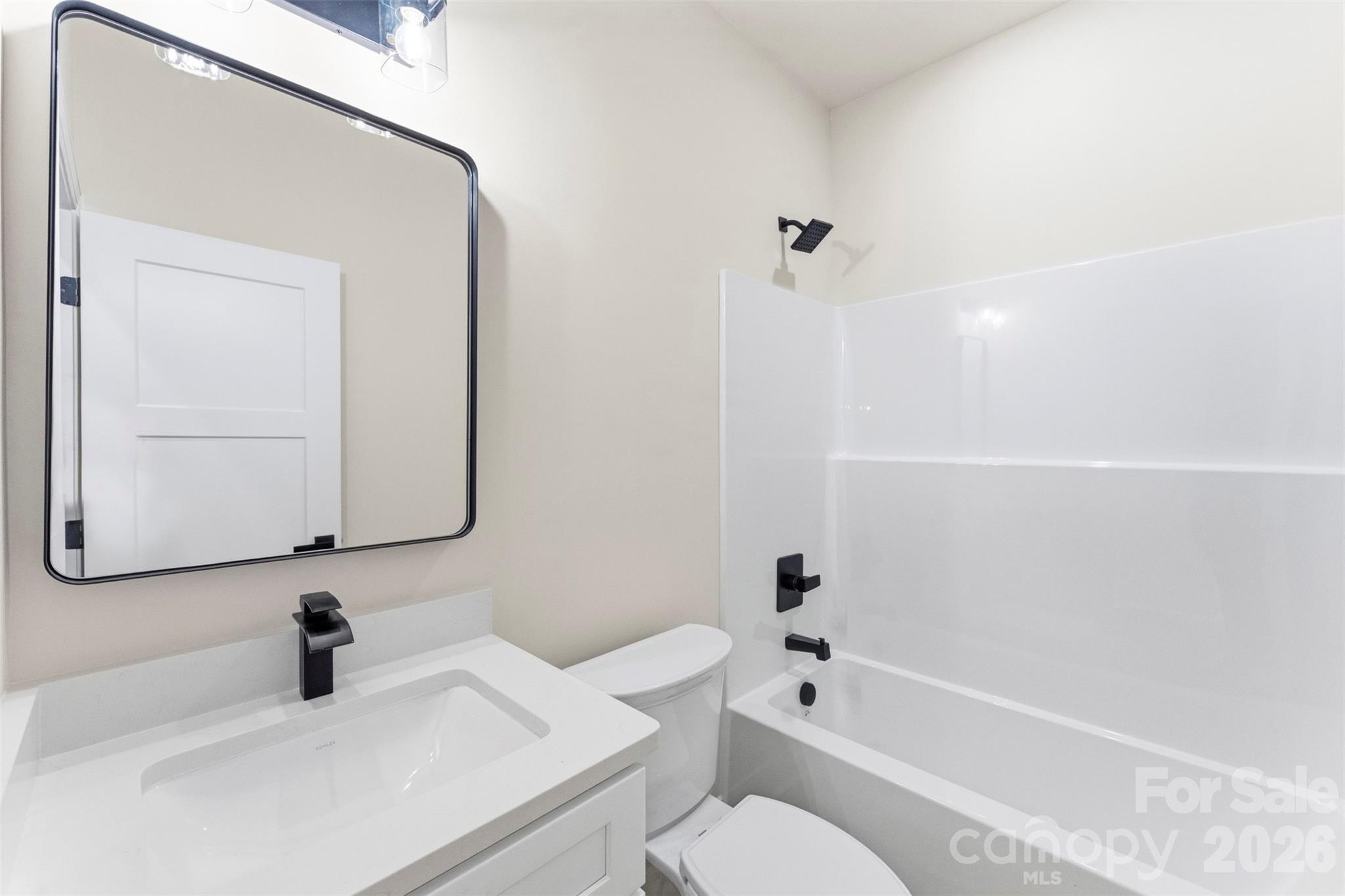 1724 Barnhardt Road China Grove, NC 28023 - Photo 34 of 46 a bathroom with a sink a toilet and shower