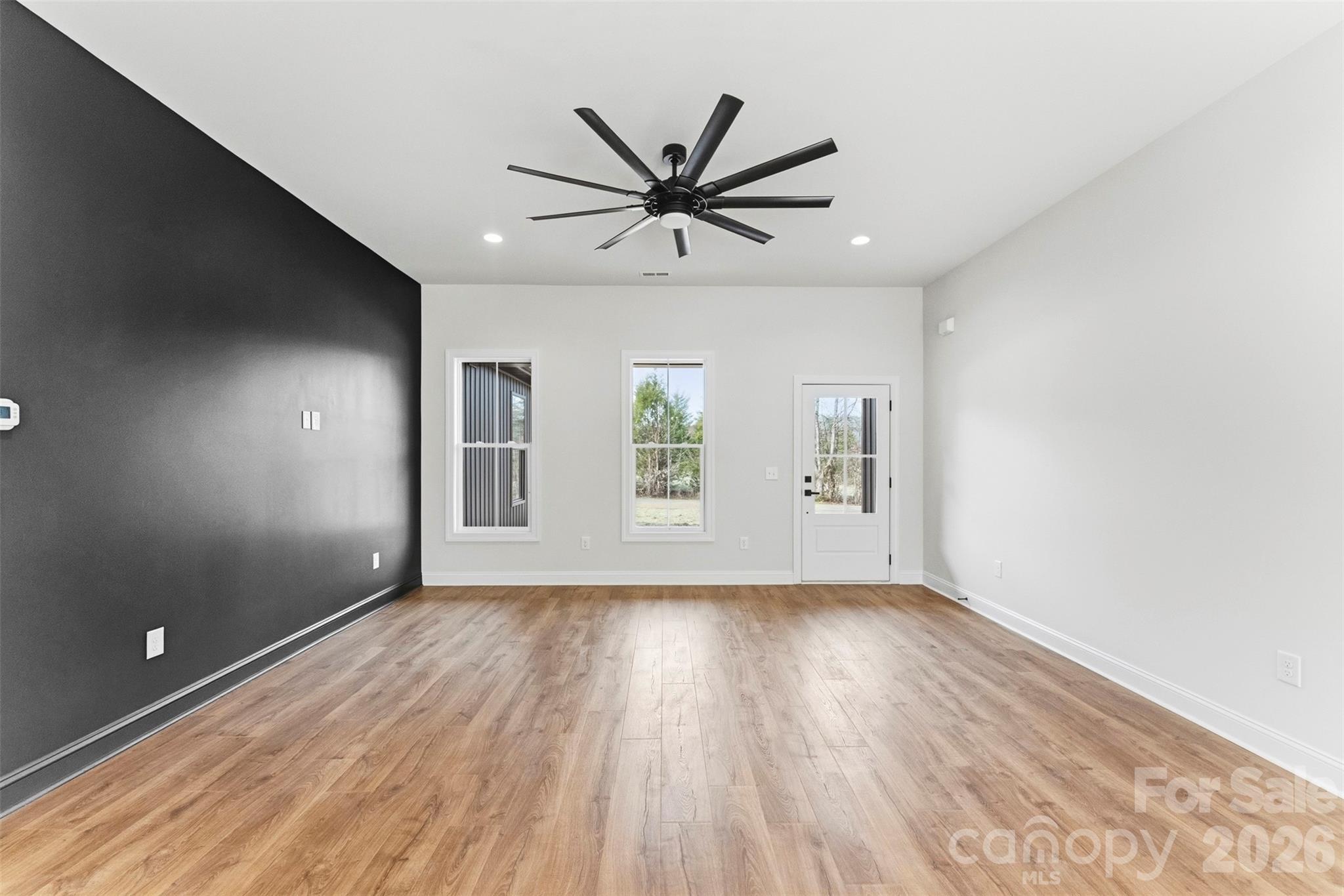 1724 Barnhardt Road China Grove, NC 28023 - Photo 9 of 46 a view of empty room with wooden floor and fan