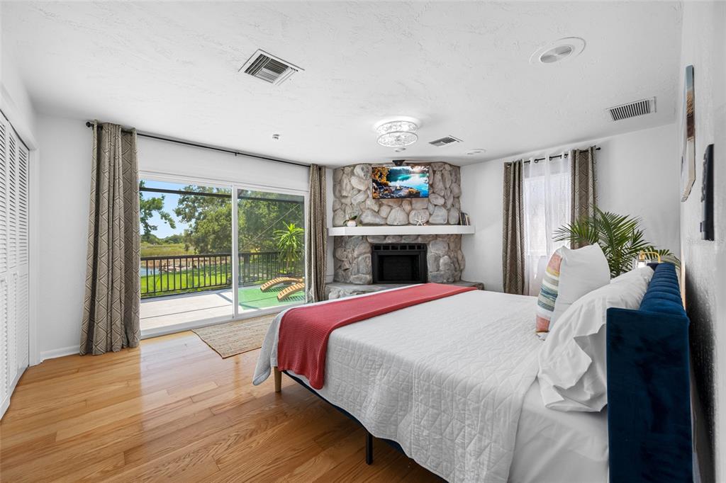 2153 Karan Way Clearwater, FL 33763 - Photo 38 of 65 a bedroom with a bed and a large window