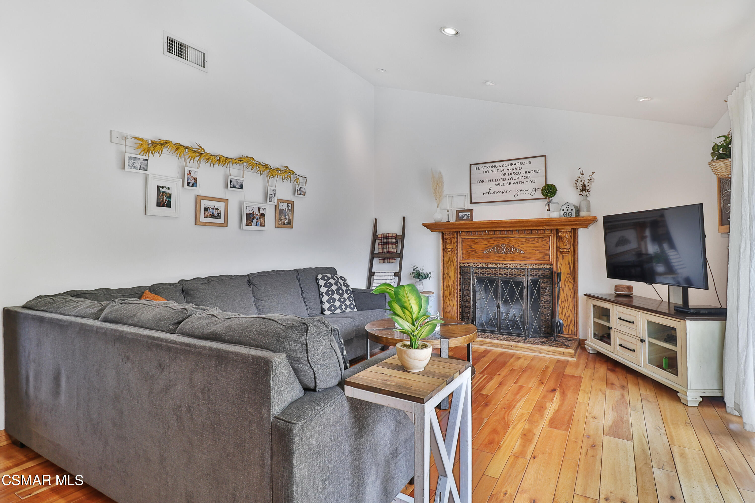 1166 Roldan Avenue Simi Valley, CA 93065 - Photo 14 of 22 a living room with furniture and a flat screen tv