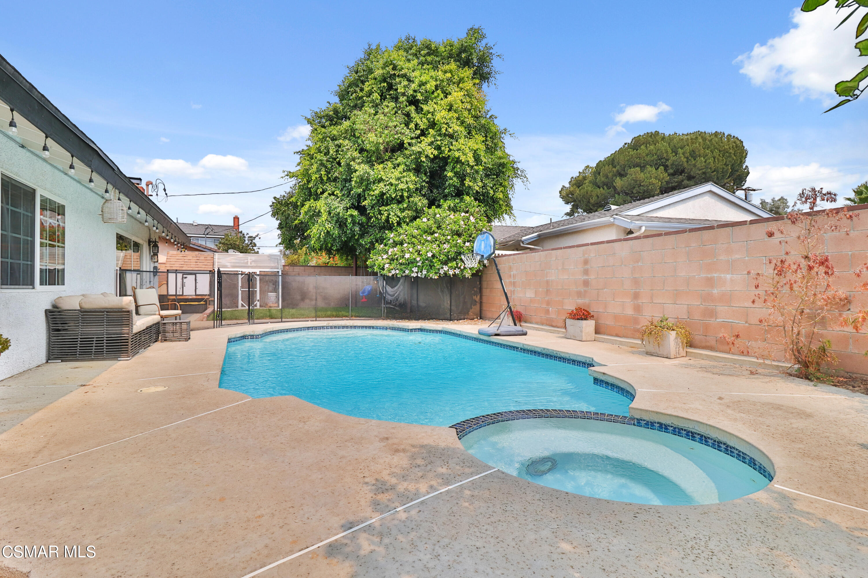 1166 Roldan Avenue Simi Valley, CA 93065 - Photo 22 of 22 a swimming pool with outdoor seating and yard